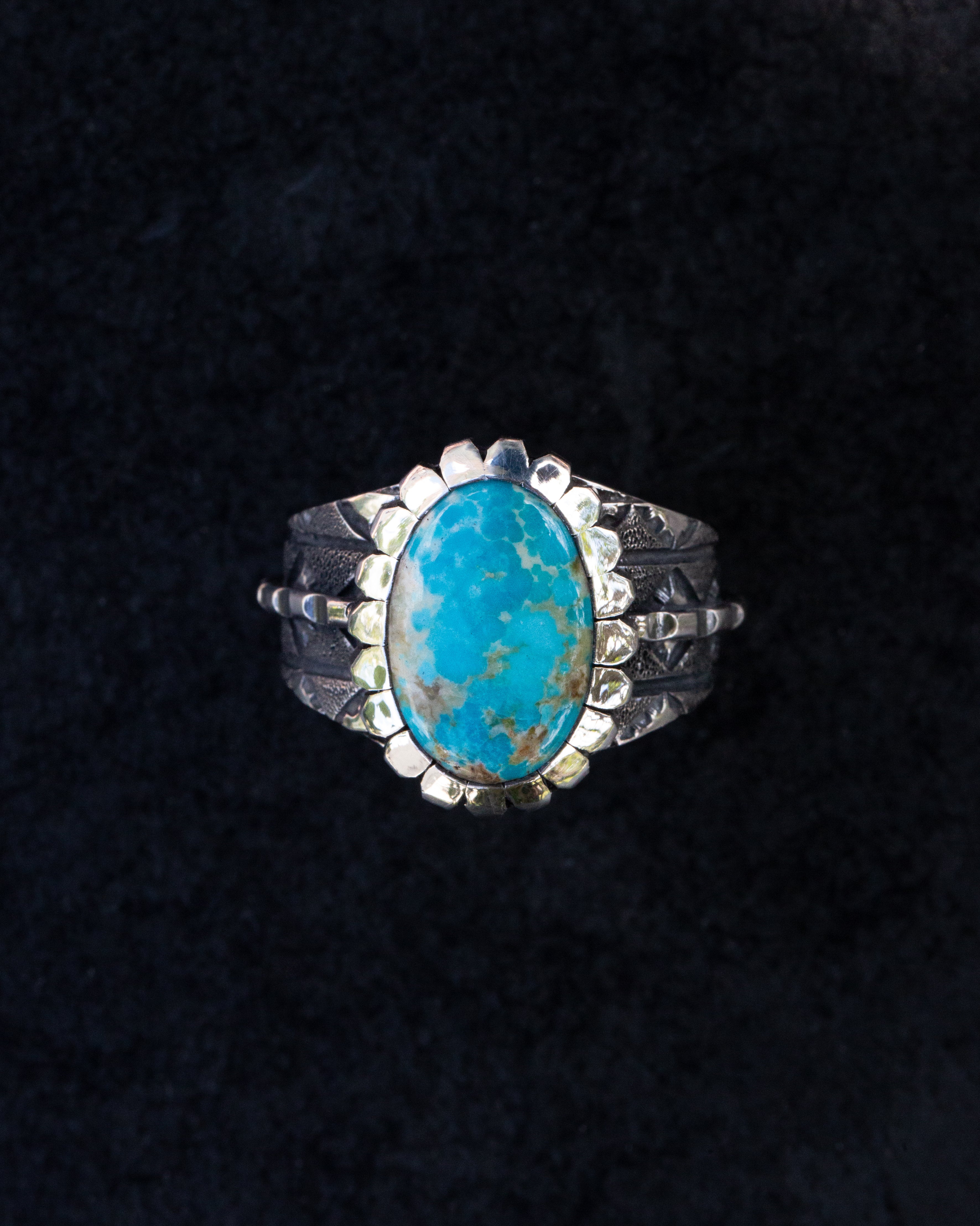 Highly Stylized Size 12.5 Kingman Turquoise, Stamped, Chased, and Textured Sterling Silver Ring With Castellated Bezel