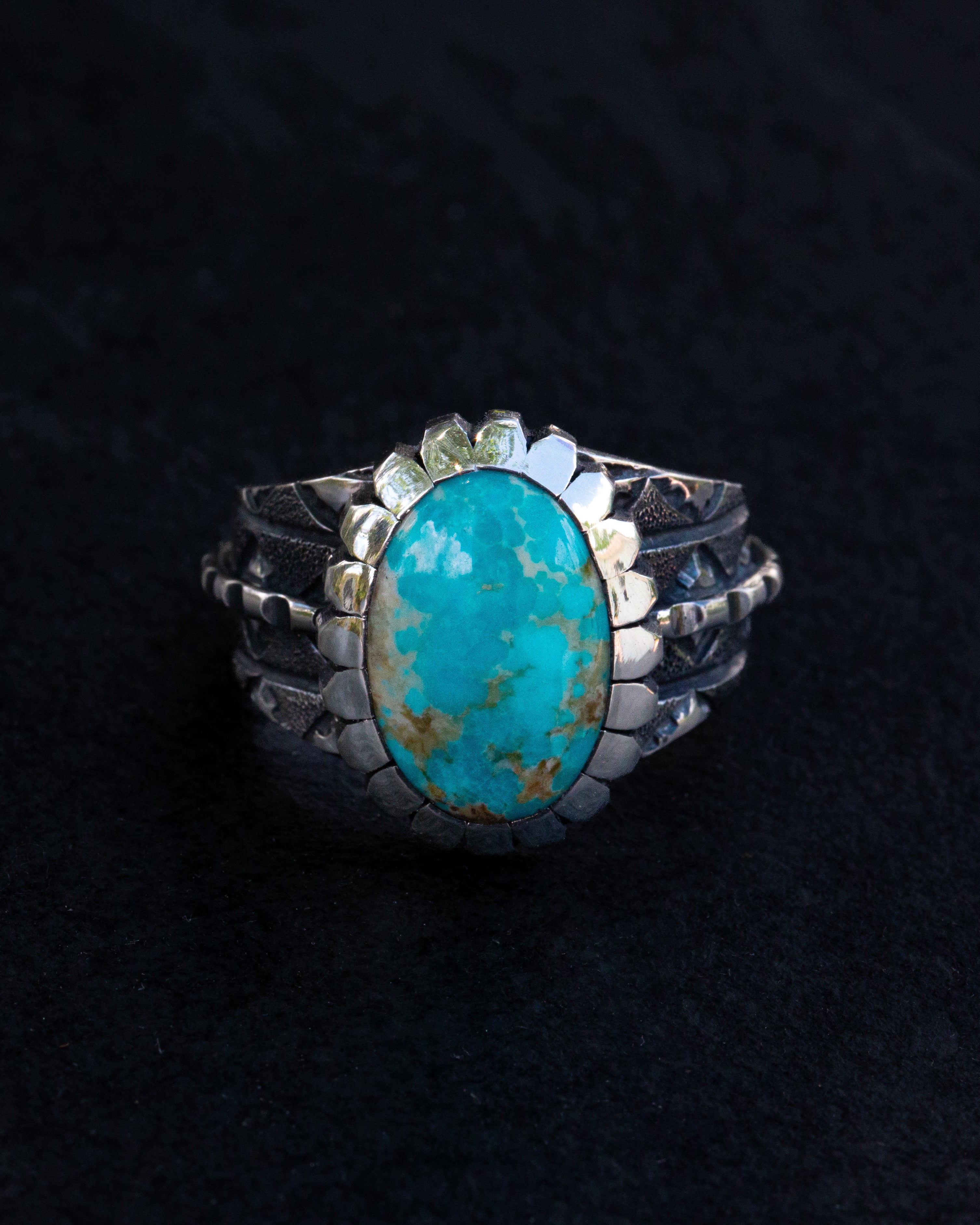 Highly Stylized Size 12.5 Kingman Turquoise, Stamped, Chased, and Textured Sterling Silver Ring With Castellated Bezel