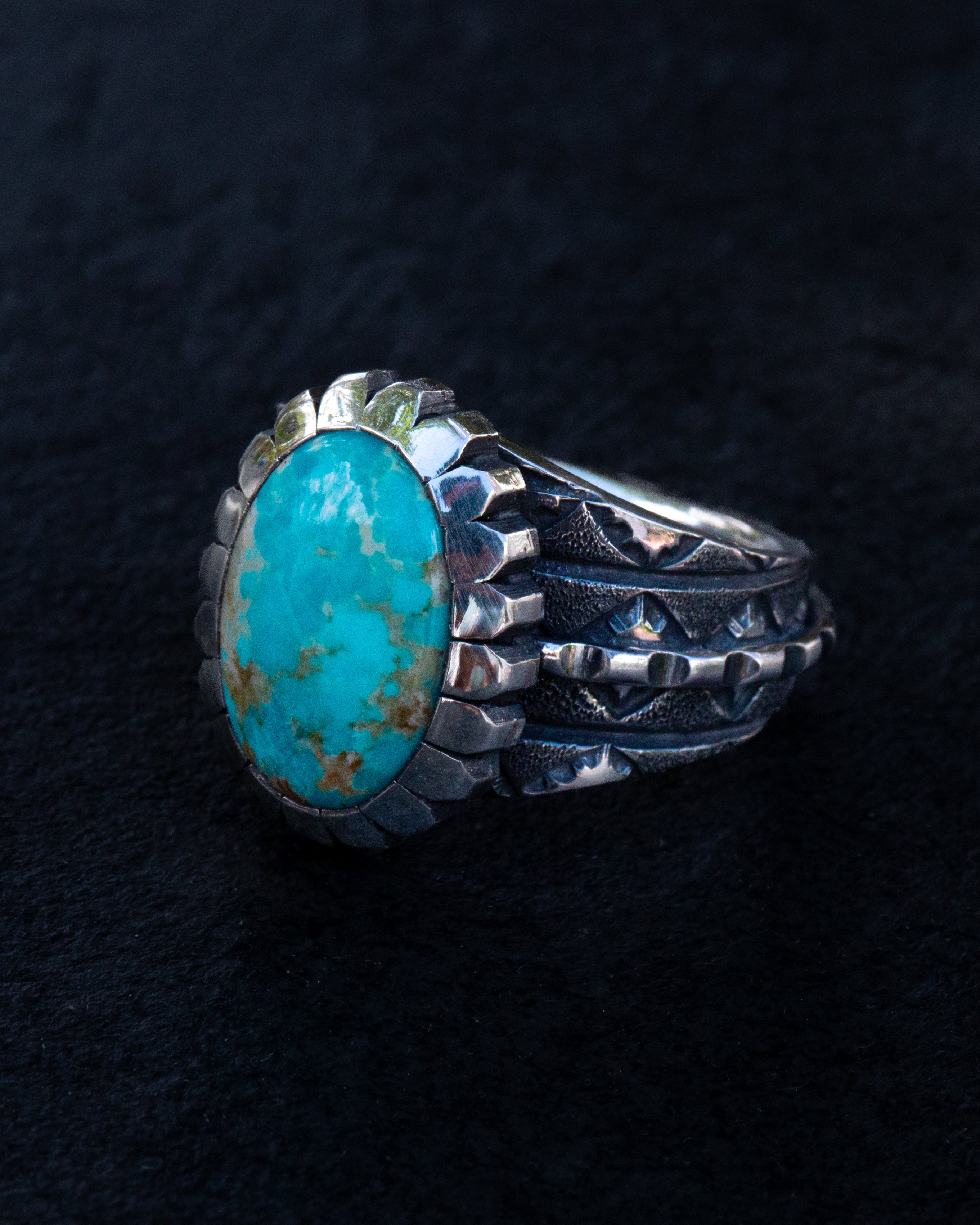 Highly Stylized Size 12.5 Kingman Turquoise, Stamped, Chased, and Textured Sterling Silver Ring With Castellated Bezel